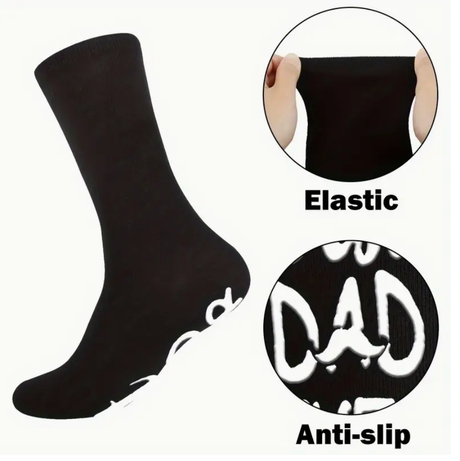 Pair of black socks that say Best Dad Ever, packaged with a free bookmark for Father's Day