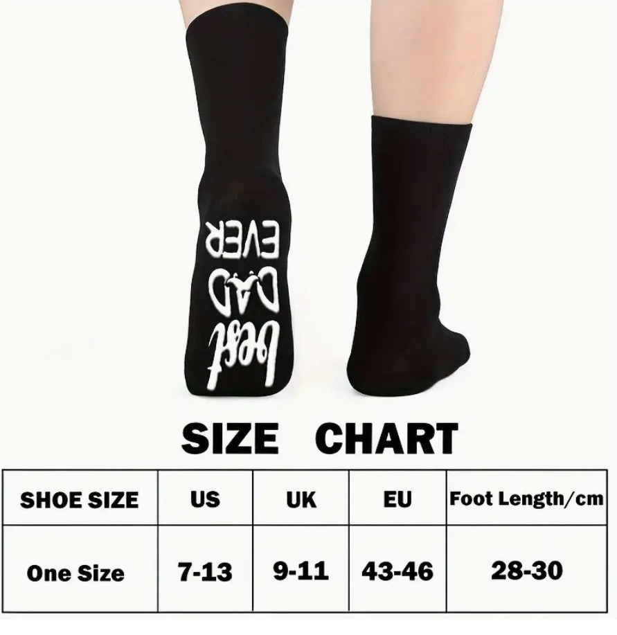 Pair of black socks that say Best Dad Ever, packaged with a free bookmark for Father's Day