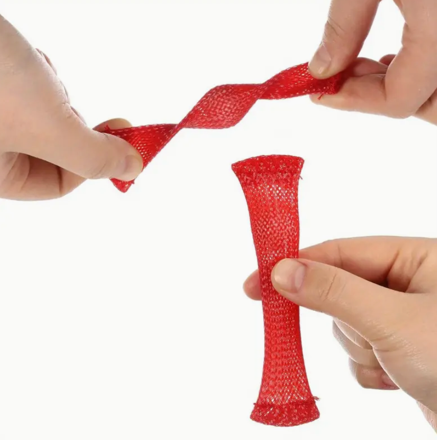 Red mesh tie being manipulated by hands on a white background
