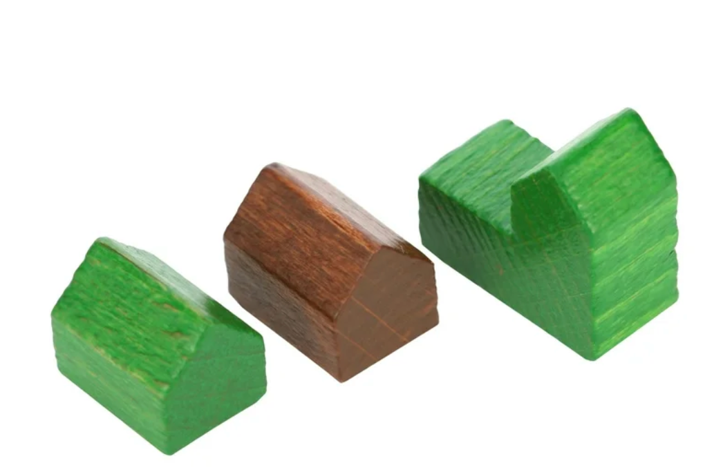 Three wooden blocks in green and brown on a white background