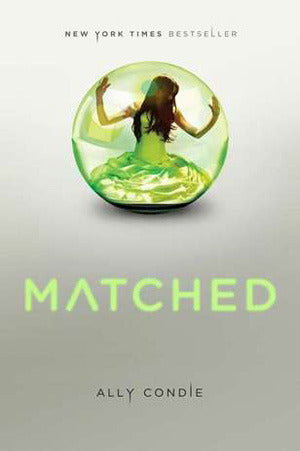 Cover of Matched by Ally Condie featuring a girl in a green dress trapped inside a glass orb against a pale background