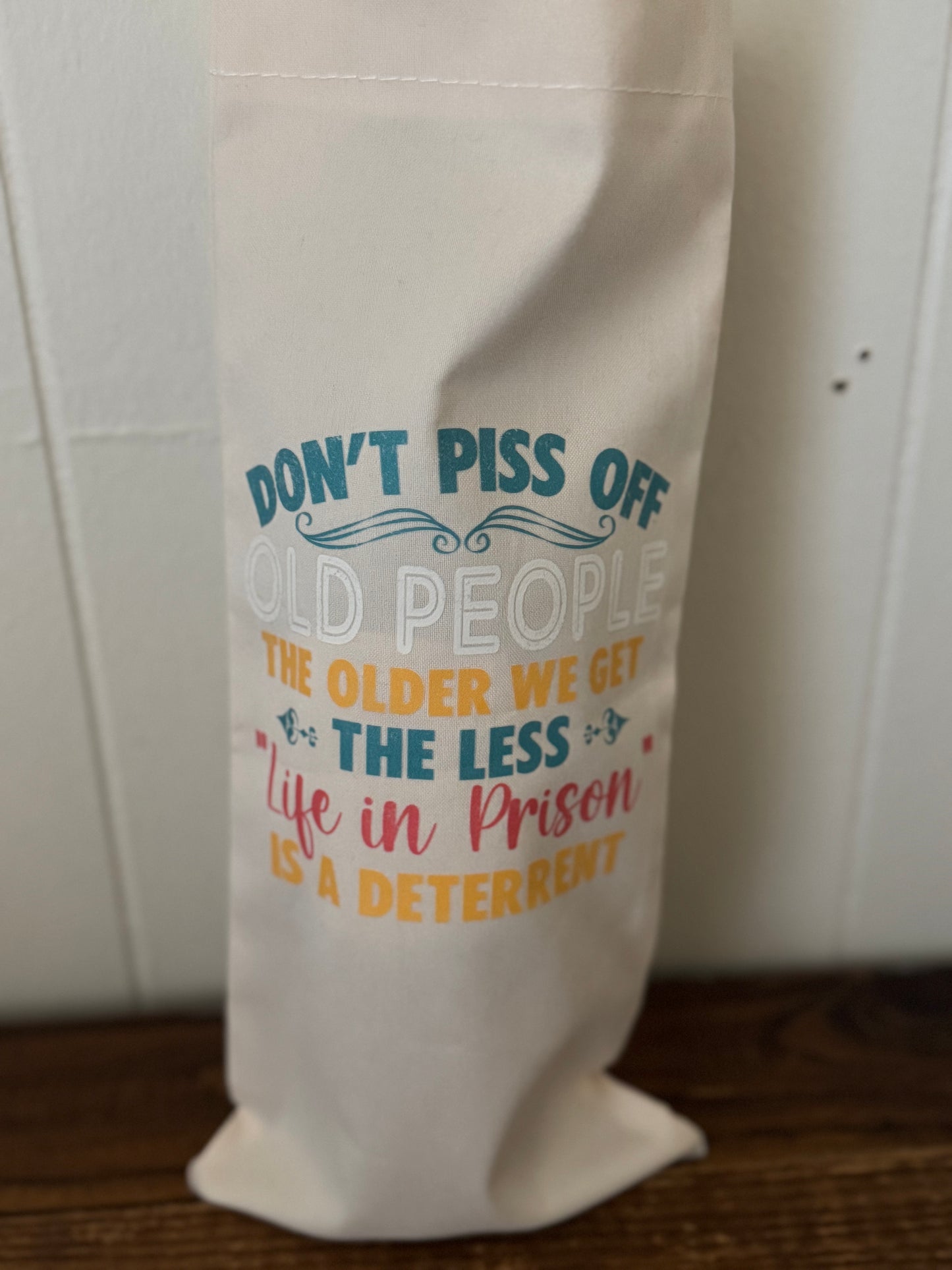 White bag with colorful text on a white background
