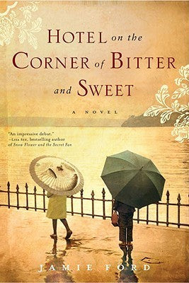 Book cover of 'Hotel on the Corner of Bitter and Sweet' with two people holding umbrellas under a rain-soaked street.