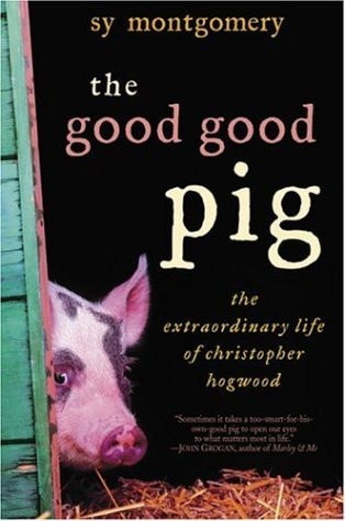 Cover of The Good Good Pig by Sy Montgomery, featuring a black-and-white pig peeking through a wooden fence.