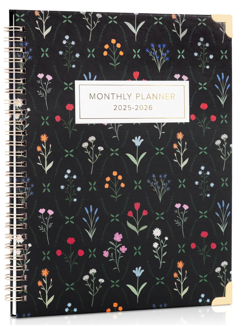 Monthly planner with floral design on a black background