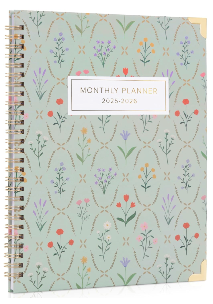 Monthly planner with floral pattern and '2025-2026' text on a light blue background