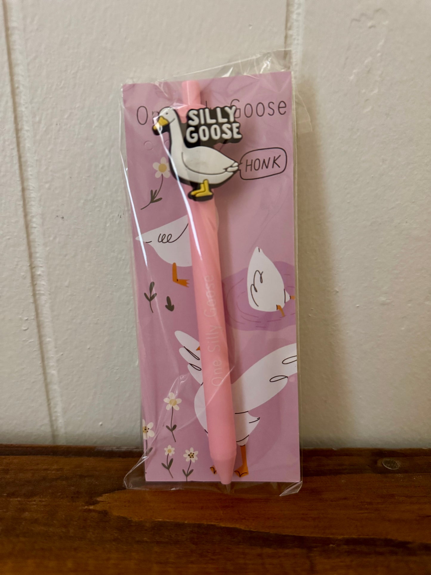 Goose-themed pen and bookmark set with pen labeled One Silly Goose and illustrated goose bookmark