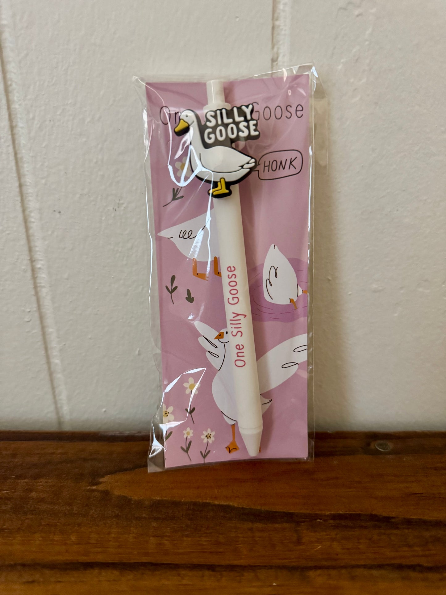 Goose-themed pen and bookmark set with pen labeled One Silly Goose and illustrated goose bookmark
