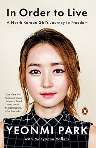 Cover of In Order to Live by Yeonmi Park featuring a portrait of the author against a dark background