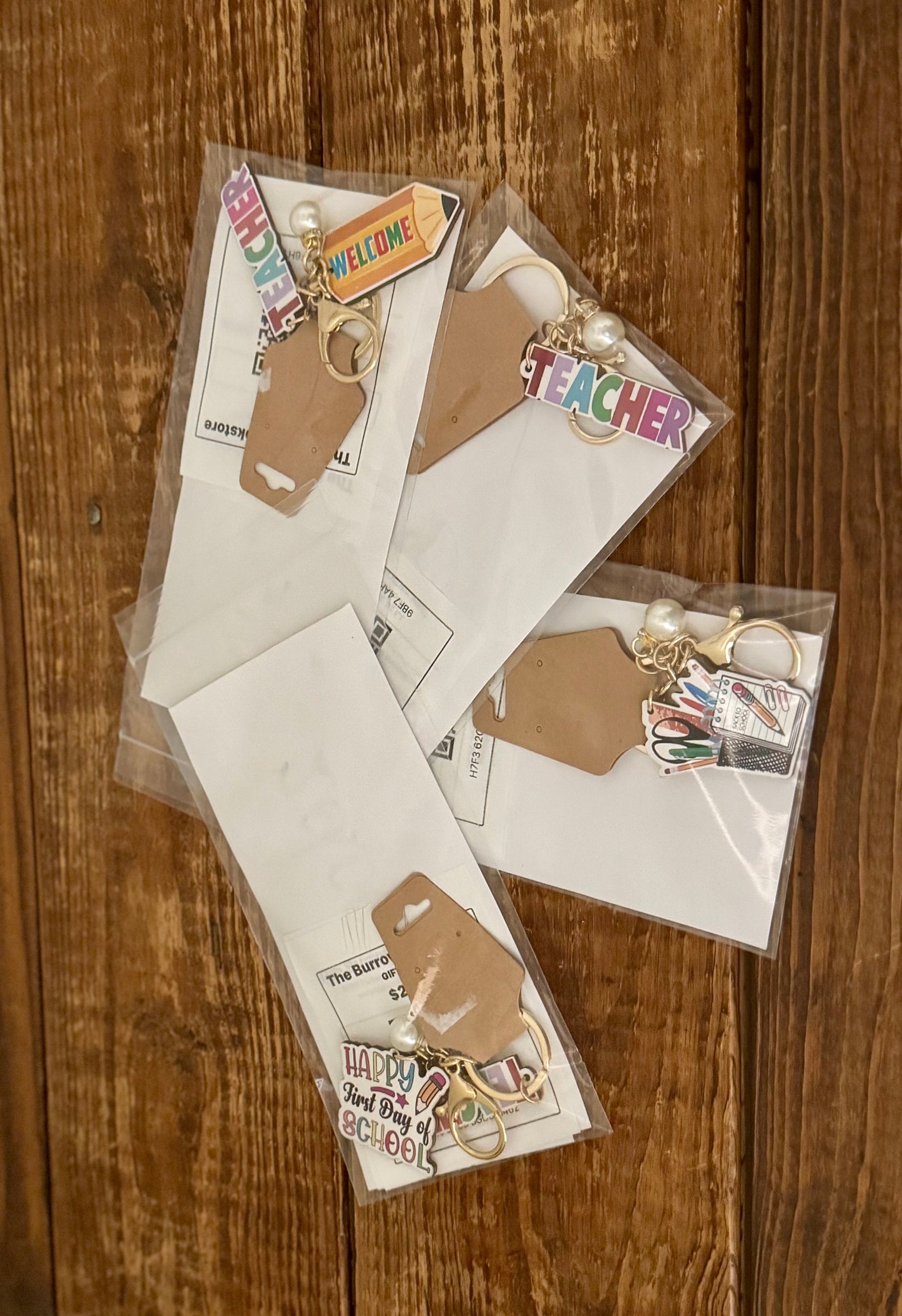 Set of greeting cards and gift tags on a wooden surface