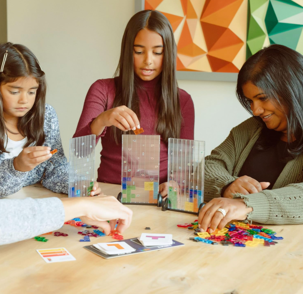Tetris Strategy Puzzle Game with colorful Tetrimino pieces arranged on a board, ideal for family game night