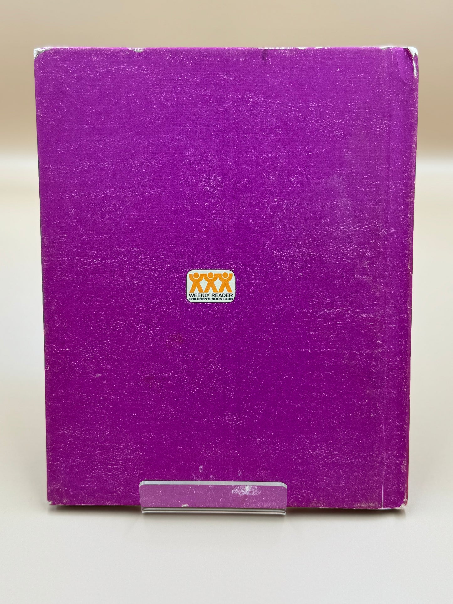 Purple box with a logo on a white background