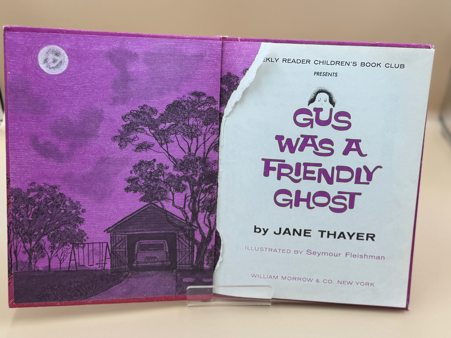 Children's book titled 'Gus Was a Friendly Ghost' by Jane Thayer with purple cover and white text.