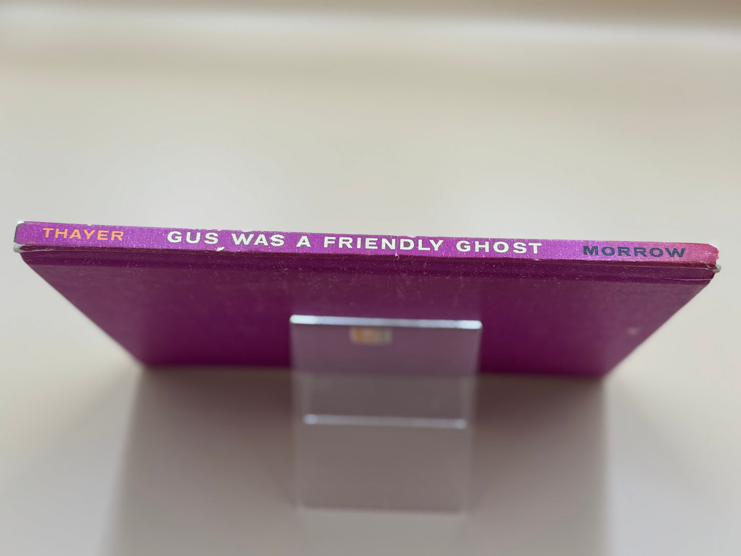 Purple book cover with white text on a white background