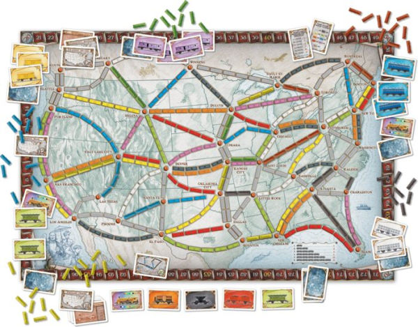 Board game with colorful tracks and cards on a white background