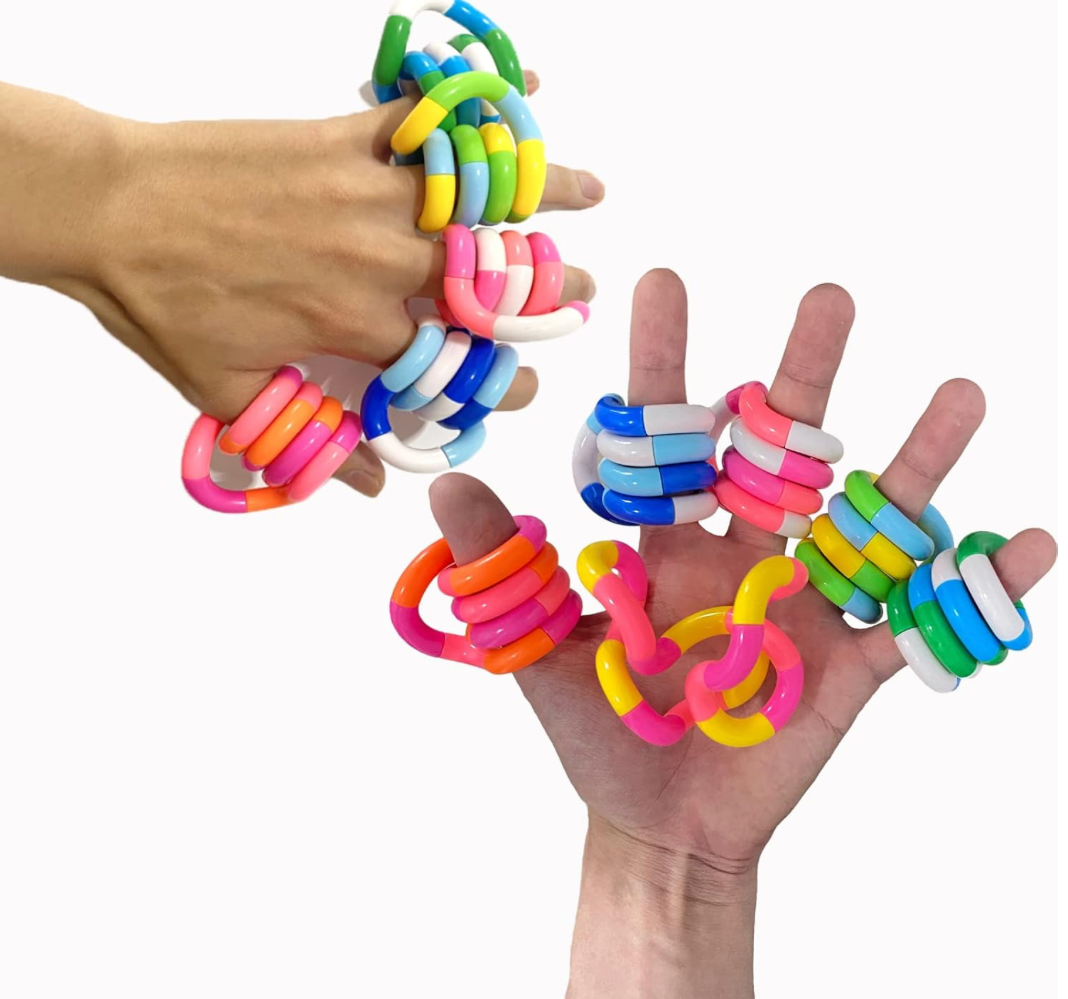 Multicolored twisty fidget toys shown in various shapes and color combinations, designed for sensory play and stress relief