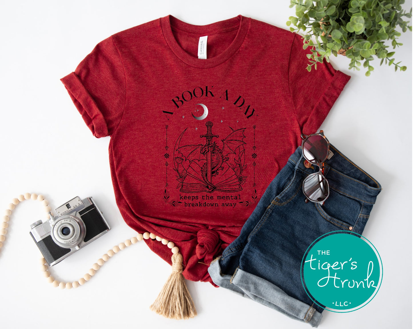 Unisex casual t-shirt with dragon design and reading humor, bibliophile apparel gift idea