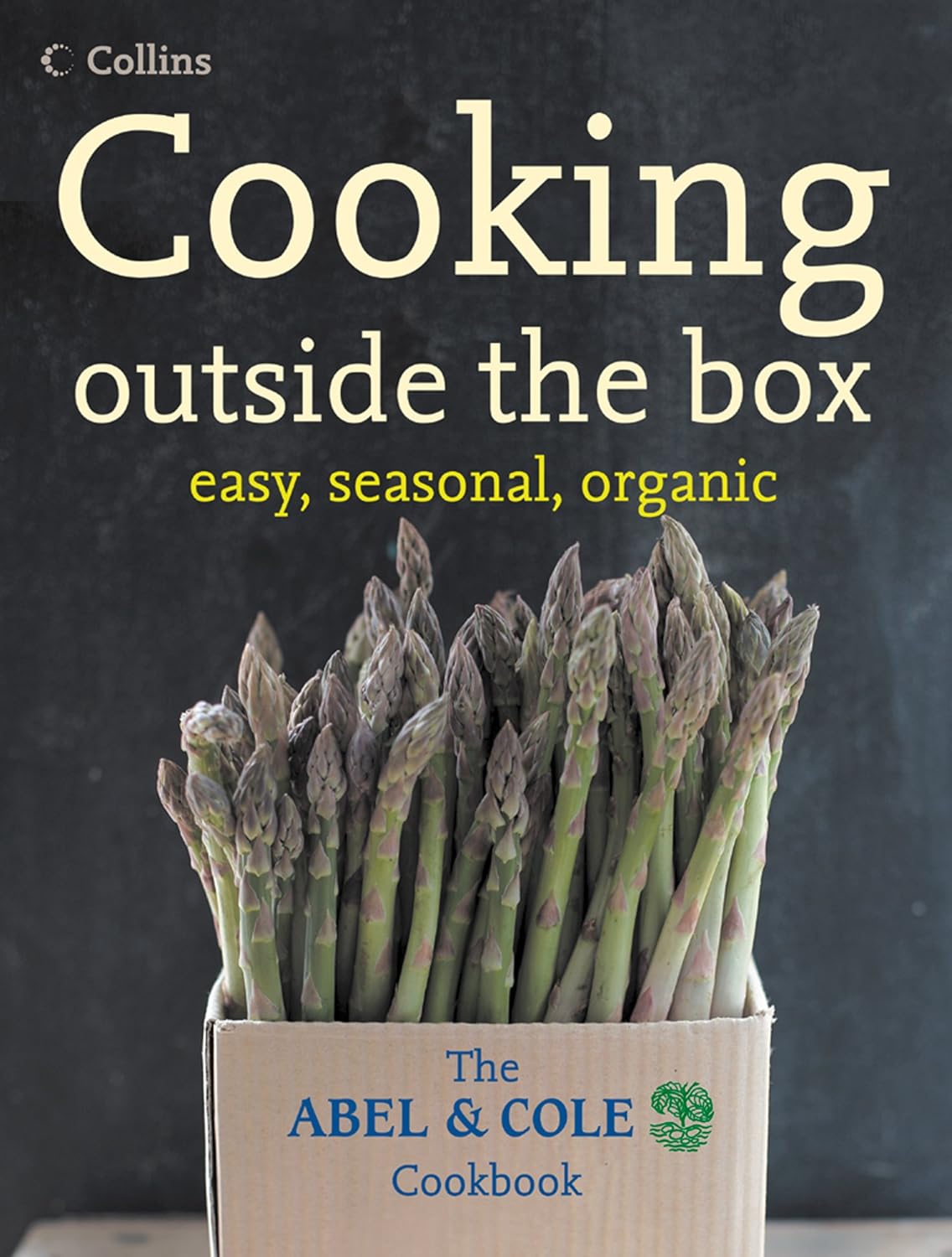 Cover of Cooking Outside the Box by Abel & Cole, a cookbook focused on seasonal organic recipes.