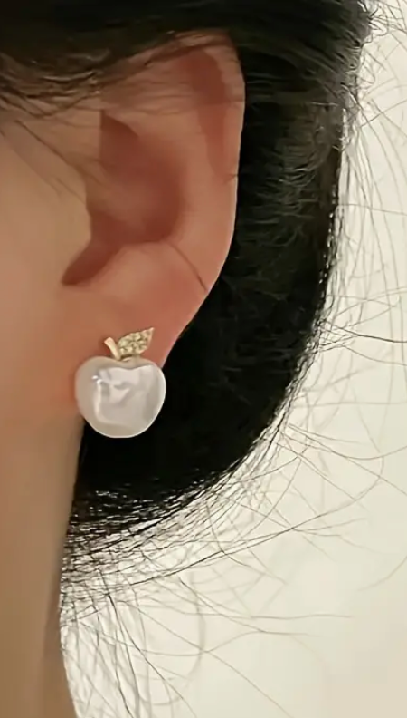 A pair of stylish apple-shaped earrings, perfect for teachers, fruit lovers, or anyone who loves unique and playful accessories.
