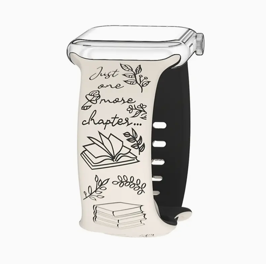 Glass carafe with black handle and decorative text and illustrations on a white background