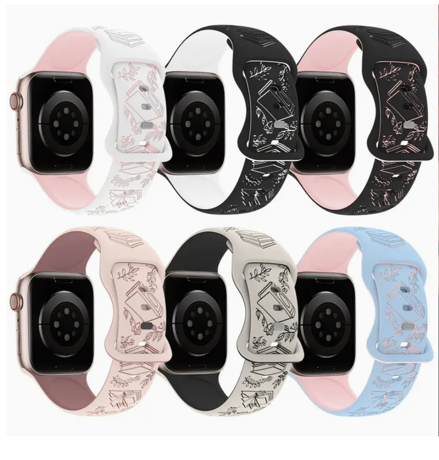 Collection of various Apple Watch bands on a white background