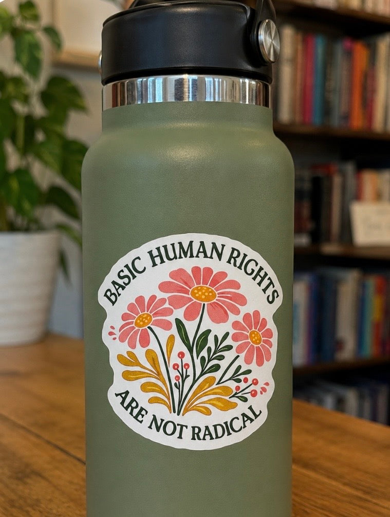 Three-inch vinyl sticker featuring pink flowers with the phrase Basic Human Rights Are Not Radical.