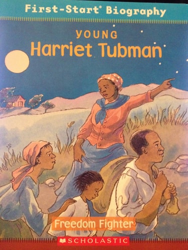 Cover of Young Harriet Tubman: Freedom Fighter by Anne Benjamin, featuring an illustration of Harriet Tubman leading others to freedom