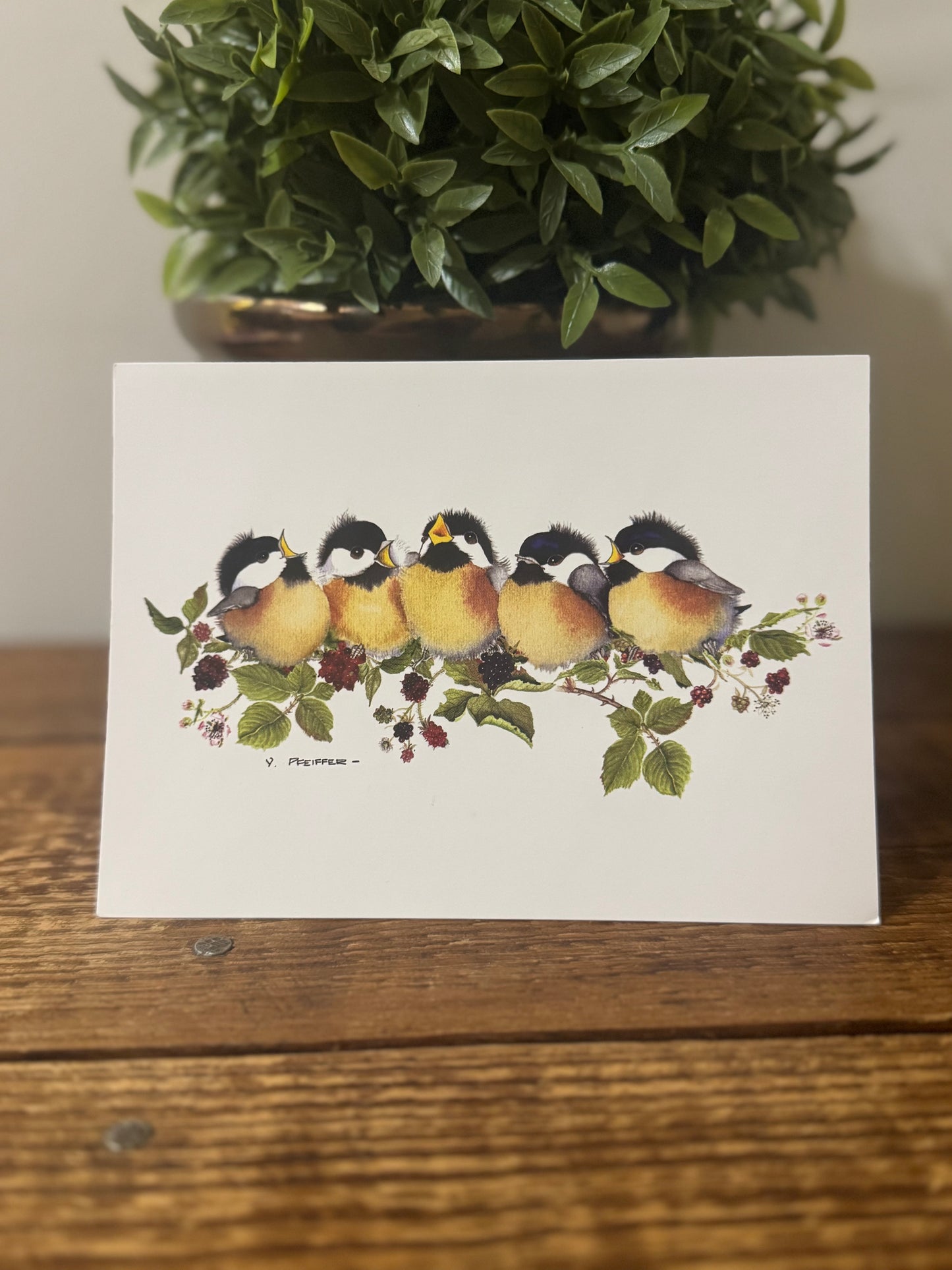 A beautifully designed notecard featuring birds and flowers, perfect for personal messages, thank-you notes, or special occasions.
