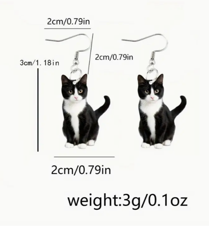 Cat-shaped earrings with measurements and weight displayed on a white background