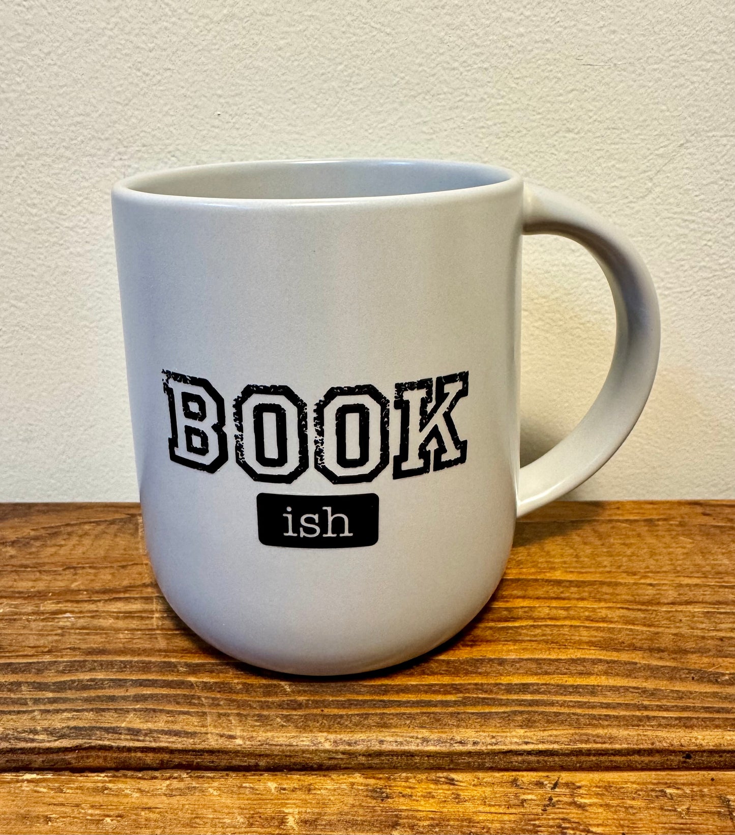Ceramic mug with the word Book-ish printed on the front, perfect for book lovers and readers with a literary sense of humor.