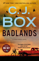 Cover of Badlands by C.J. Box, depicting a desolate North Dakota landscape under a stormy sky, hinting at the novel's suspenseful atmosphere.