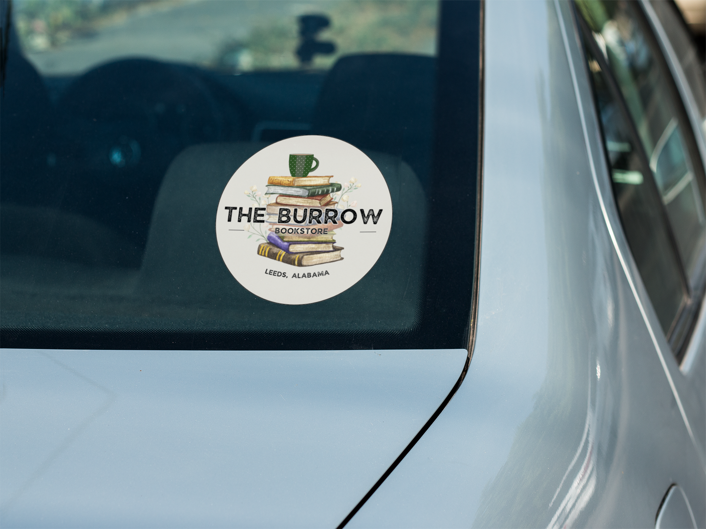 A high-quality UV-DTF sticker featuring The Burrow's logo. Waterproof, scratch-resistant, and perfect for personalizing water bottles, laptops, phones, and more. Ideal for book lovers and indie bookstore fans.