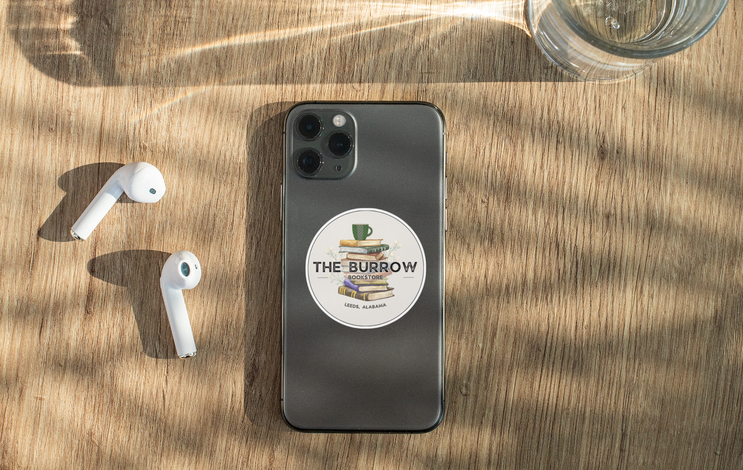 A high-quality UV-DTF sticker featuring The Burrow's logo. Waterproof, scratch-resistant, and perfect for personalizing water bottles, laptops, phones, and more. Ideal for book lovers and indie bookstore fans.