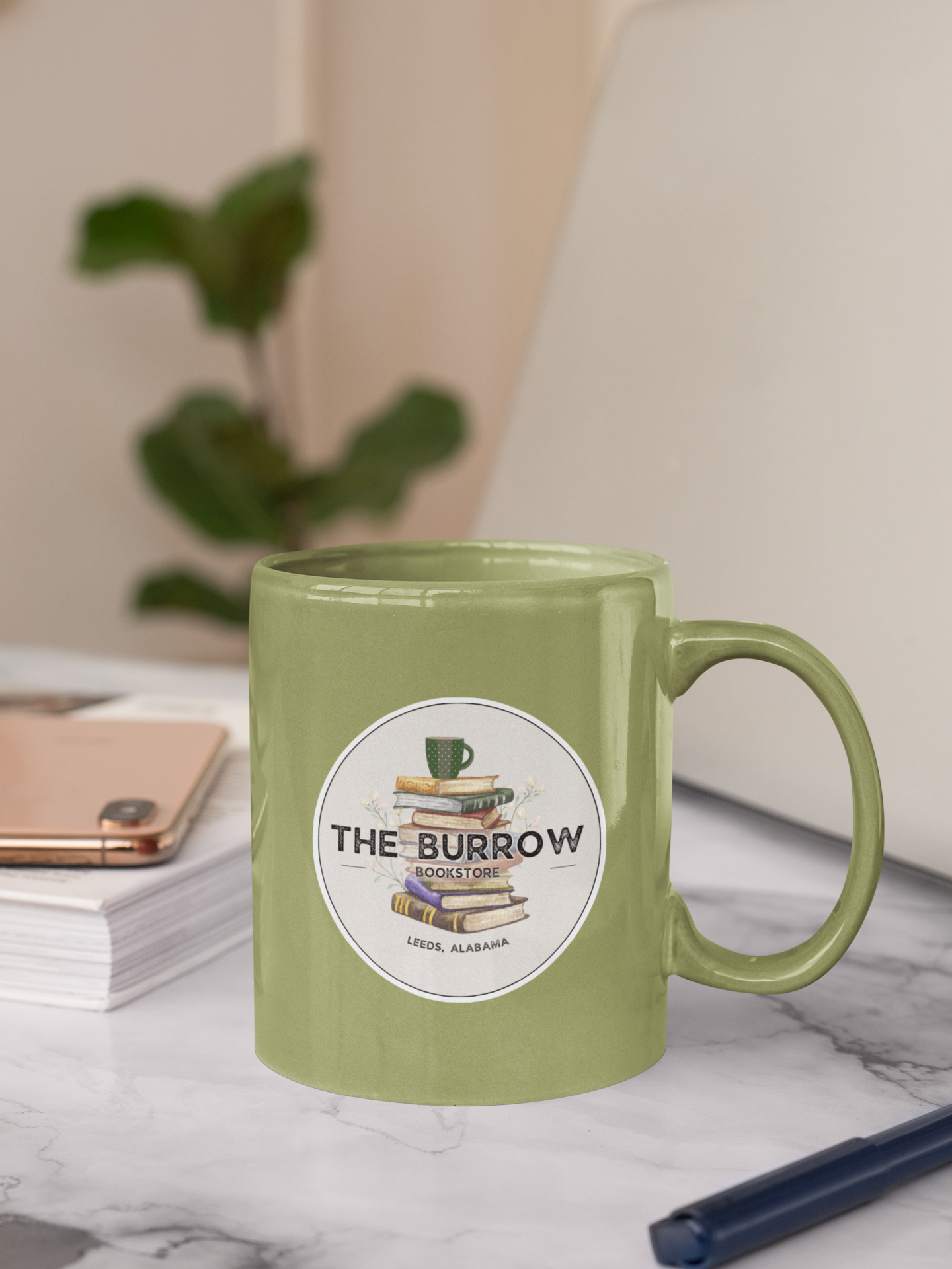 A high-quality UV-DTF sticker featuring The Burrow's logo. Waterproof, scratch-resistant, and perfect for personalizing water bottles, laptops, phones, and more. Ideal for book lovers and indie bookstore fans.