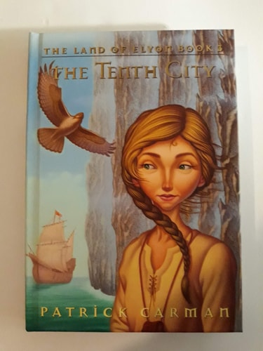 Cover of The Tenth City by Patrick Carman, depicting Alexa Daley amidst a mystical landscape, symbolizing her quest in the Land of Elyon.
