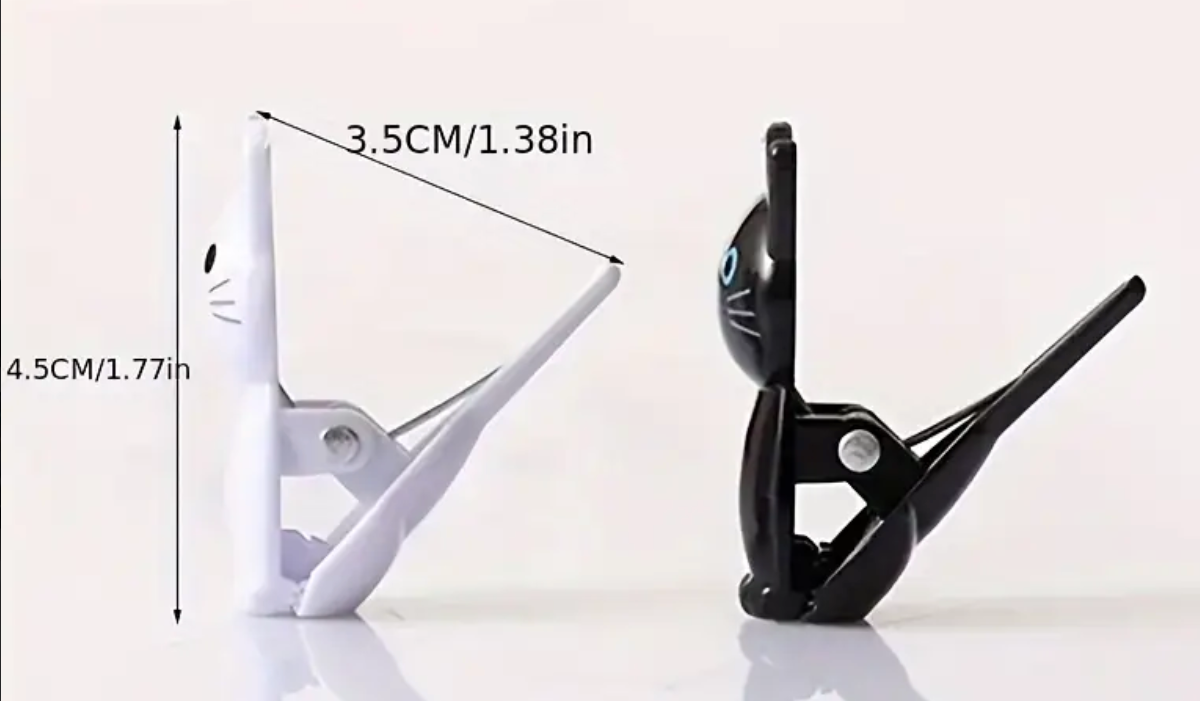 Black and white bicycle seatpost reducers with measurements on a white background
