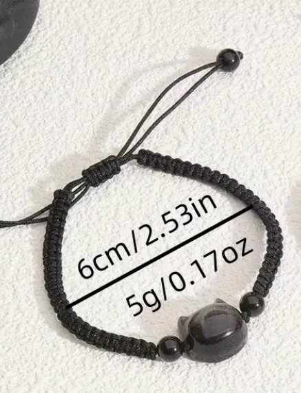 Black braided bracelet with beads on a white background, showing size and weight measurements.