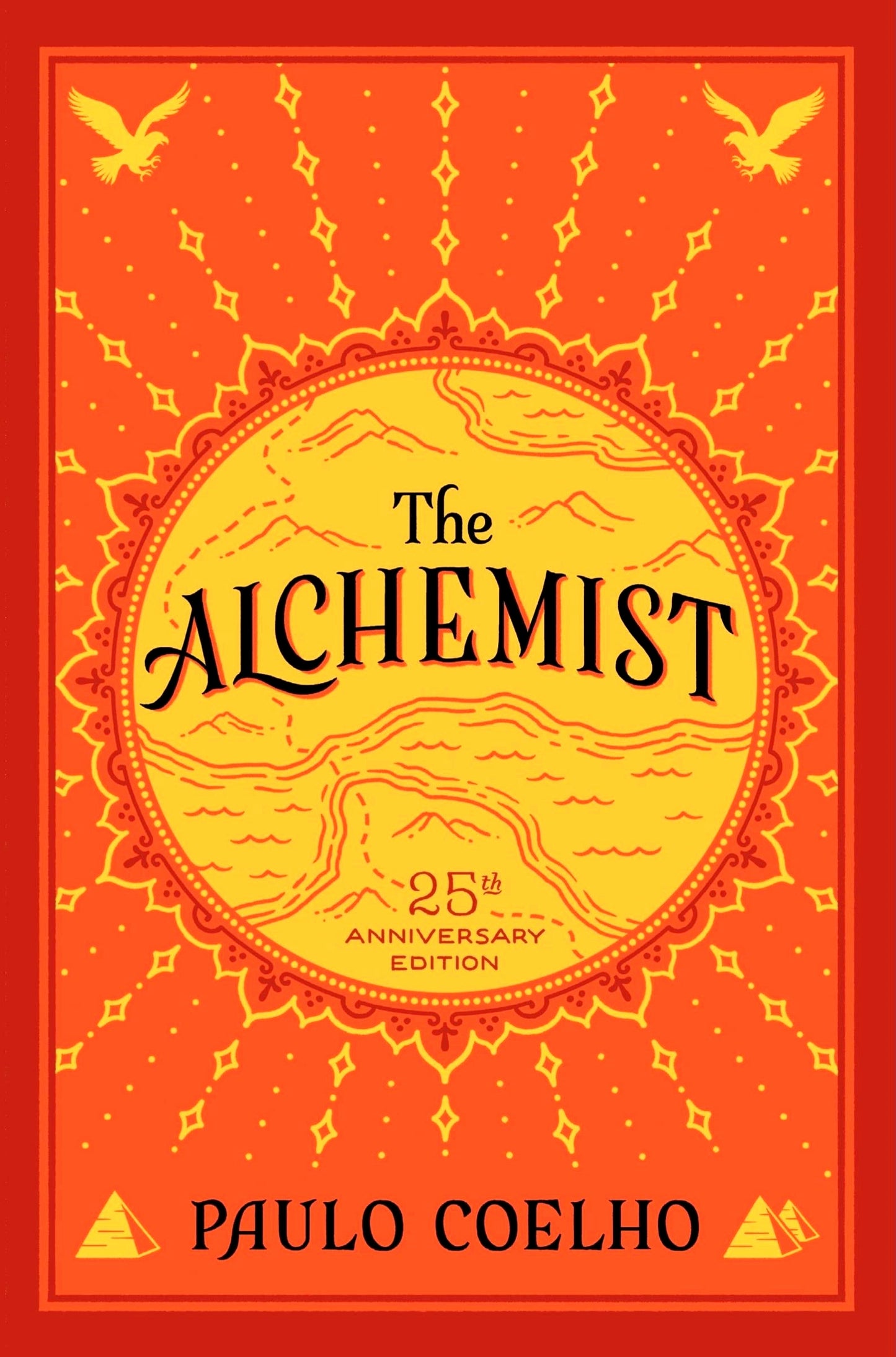 Cover of The Alchemist by Paulo Coelho, featuring an illustration of a desert landscape with pyramids under a golden sky.