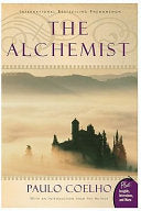 Cover of The Alchemist by Paulo Coelho, featuring an illustration of a desert landscape with pyramids under a golden sky.