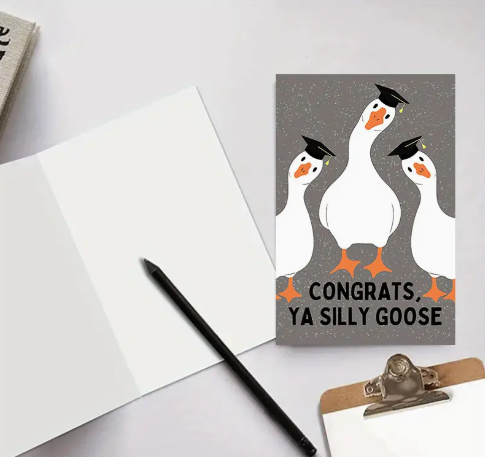 Graduation card with playful text that reads Congrats Ya Silly Goose in fun, bold lettering—perfect for a lighthearted celebration.