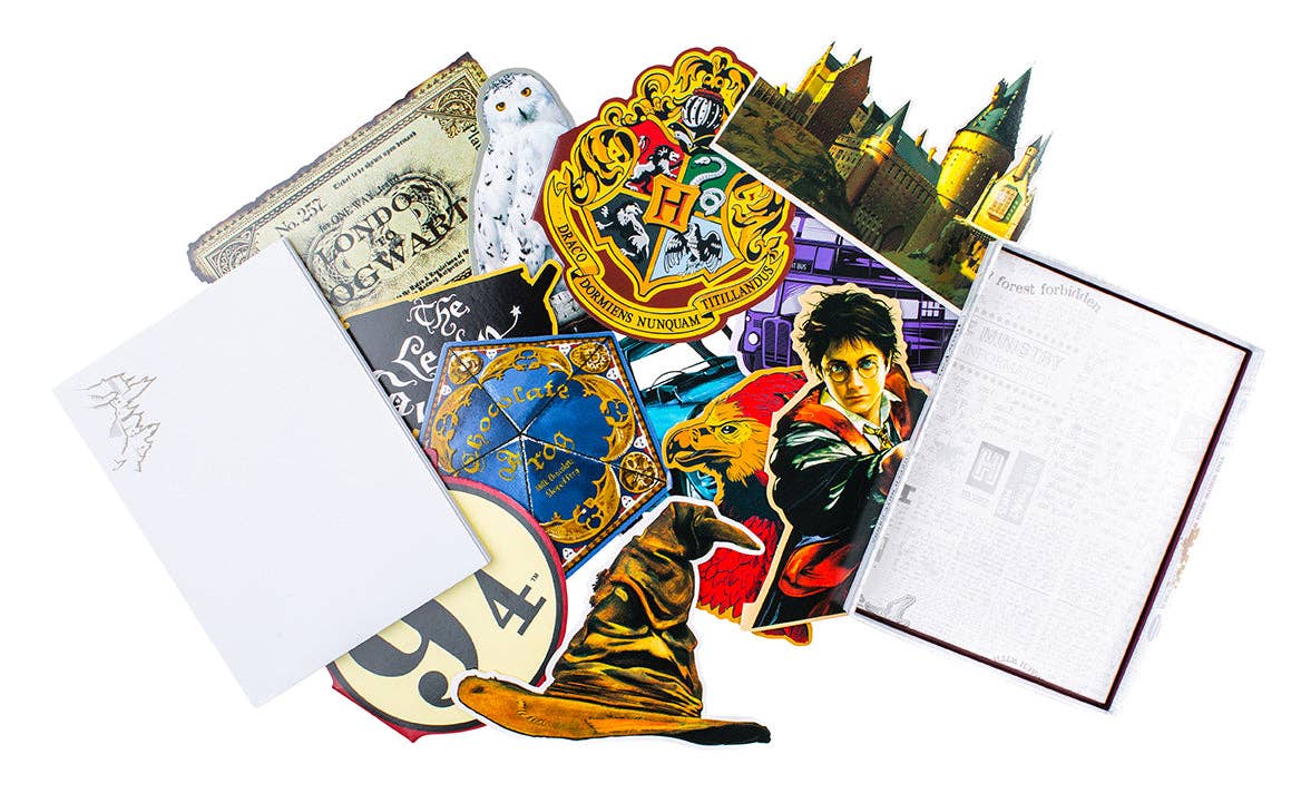 Deluxe Harry Potter die-cut note card set featuring 12 intricately designed cards and envelopes with magical Wizarding World themes.