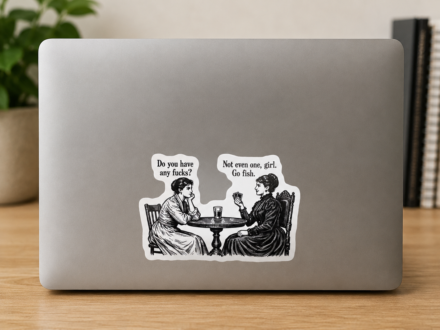 Three-inch black-and-white vintage style vinyl sticker featuring two women at a table with the humorous phrase "Do you have any fucks? Not even one, girl. Go fish."