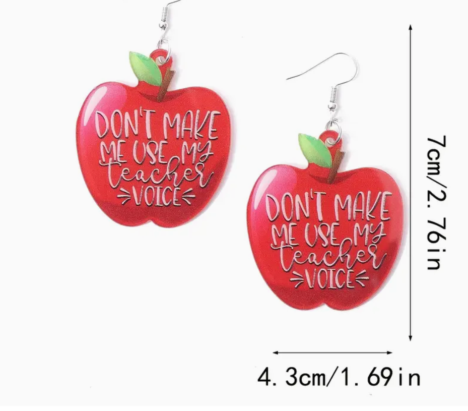 Pair of red acrylic apple-shaped earrings featuring the phrase Don’t Make Me Use My Teacher Voice, perfect for educators with a sense of humor.