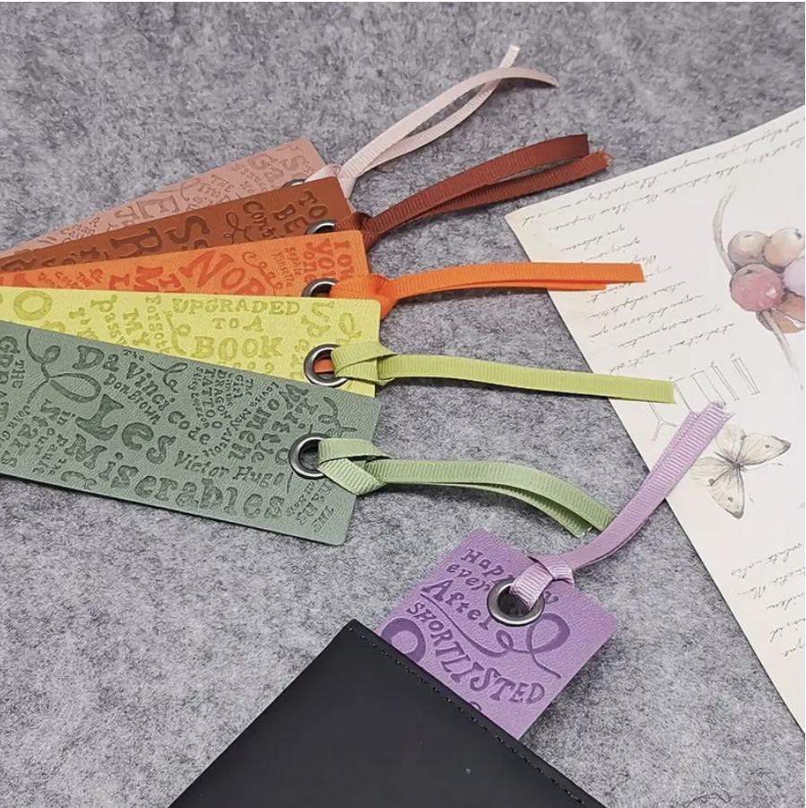 Soft and durable faux leather bookmark in a bright, colorful design—perfect for marking pages in your favorite book.
