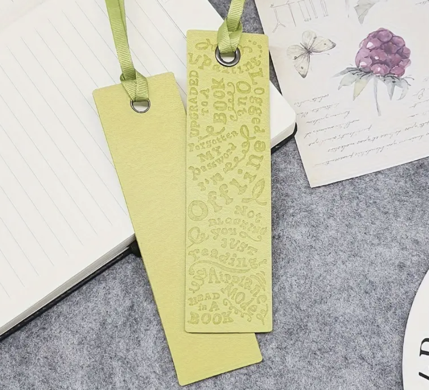Soft and durable faux leather bookmark in a bright, colorful design—perfect for marking pages in your favorite book.