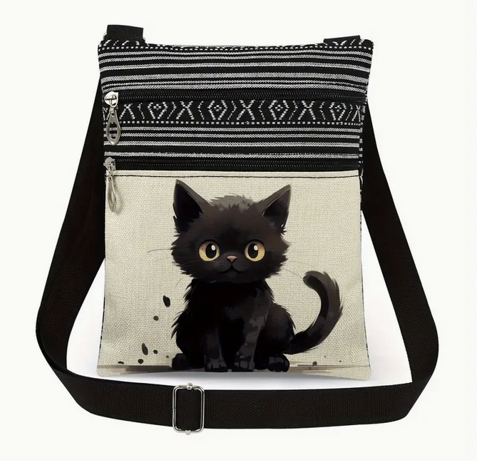 Black cat-themed crossbody bag with a striped pattern on a white background