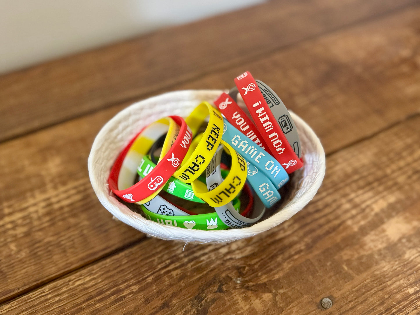 A set of colorful silicone bracelets featuring video game-themed designs, perfect for gamers, party favors, and everyday wear.