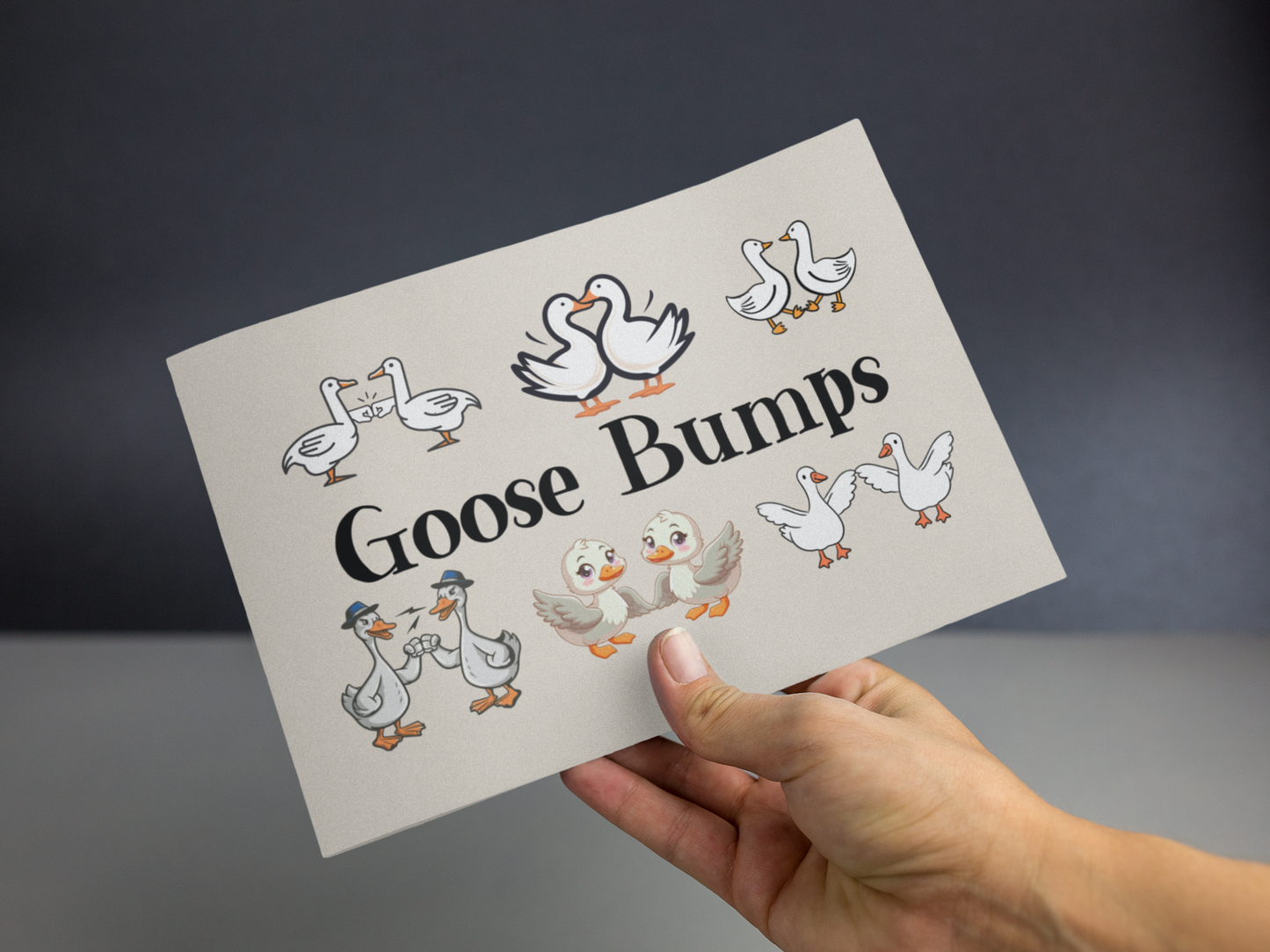 A humorous greeting card featuring geese bumping fists, wings, and chests, playfully illustrating the phrase Goose Bumps.