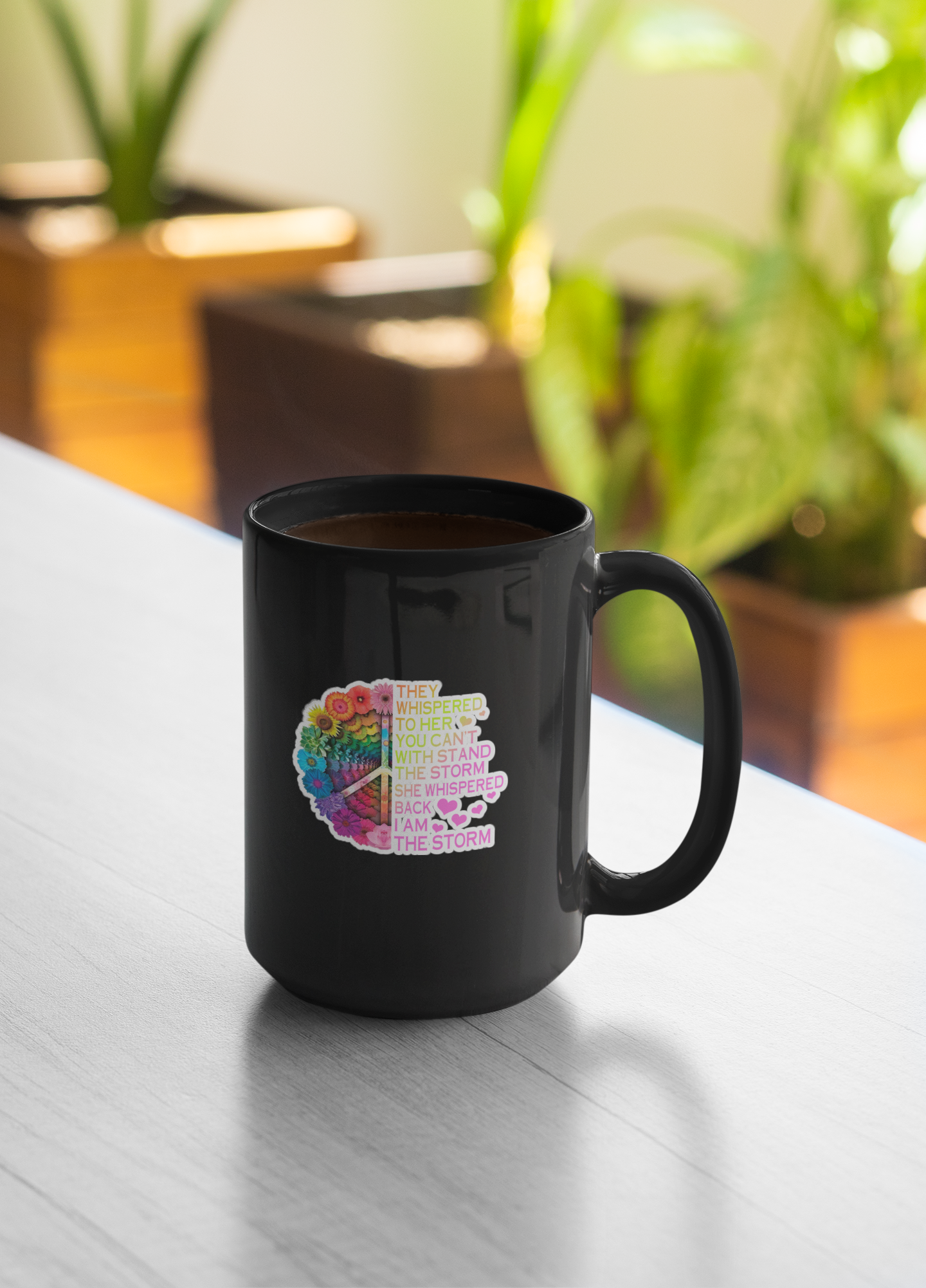 A UV-DTF sticker featuring the powerful quote They whispered to her, you can't withstand the storm. She whispered back, I am the storm. in bold, inspiring typography. Perfect for decorating water bottles, laptops, Kindles, mugs, car windows, and more.