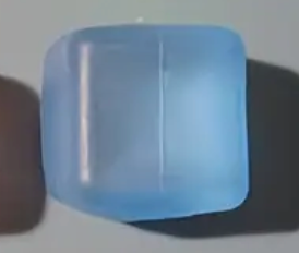 Blue square object on a dark background